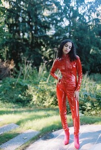 Iman in her red latex catsuit